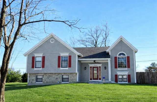 4 Bed Lenexa Home w/ Finished Basement, Solar, 3 Car Garage and Fenced Yard!! photos photos