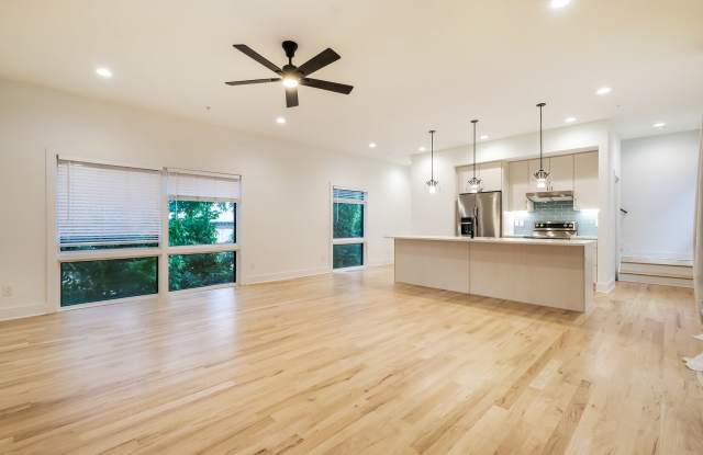 50% OFF APPLICATION FEE! Sleek 2BR Townhome-Style Condo with Rooftop Deck Gallery 4