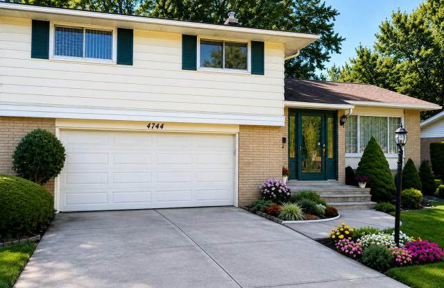 Spacious 3-Bedroom Split-Level with Formal Dining Room, Fireplace, and Fenced Backyard photos photos