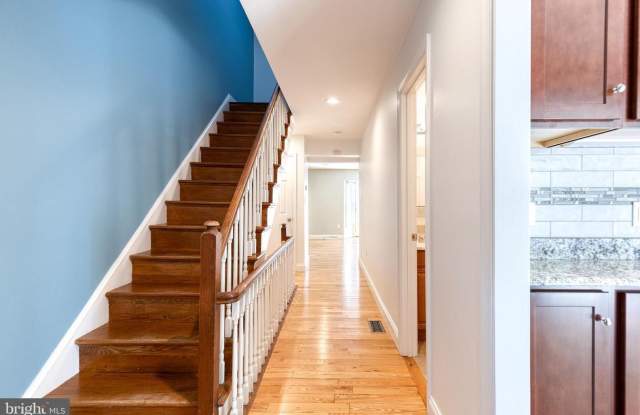 Welcome to this beautifully renovated 3-bedroom, 2-full and 2-half-bath home, ideally located in Crofton’s sought-after Triangle Gallery 3