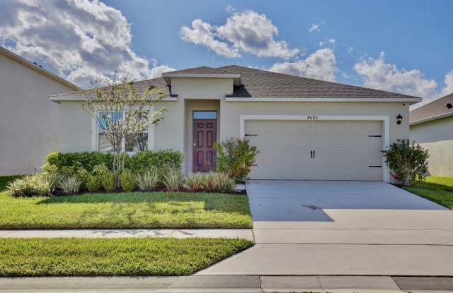 Gorgeous 4/2 Modern Home with a 2 Car Garage in the Desirable Riverbend Community - Sanford! photos photos