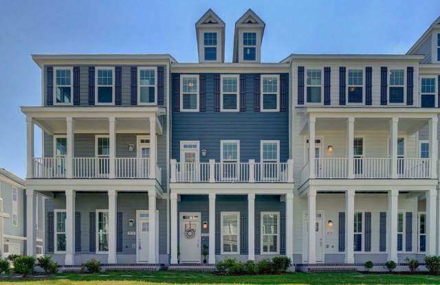 Available 08-05-25! Coastal Luxury Townhome! Pet Friendly! 2-Car Oversized Garage! photos photos