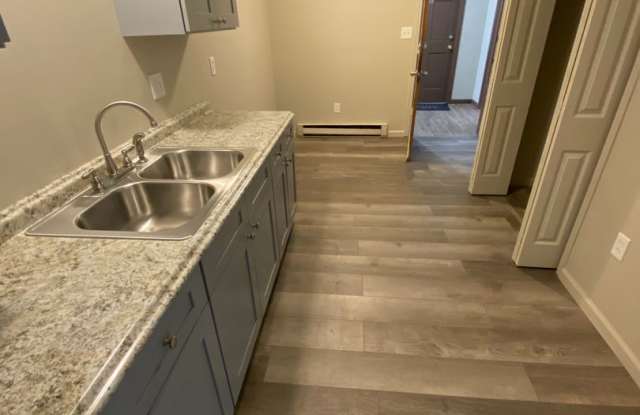 Available Now- 2 Bedroom updated apartment on second level with spacious closets and washer/dryer hookup photos photos