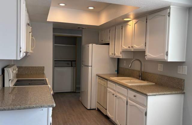 Partially furnished Cozy second-floor condo in a gated Southwest community 2 bedrms+2baths photos photos