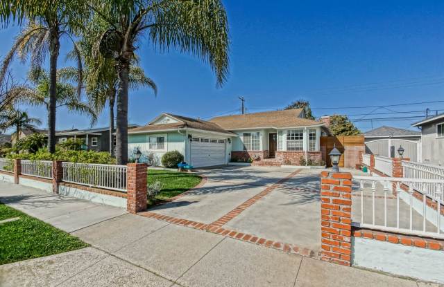 REMODELED, BRIGHT  AIRY, 4BR3BA HOME W/ GATED DRIVEWAY, 2-CAR GARAGE, FRONT  REAR YARDS CLOSE TO SCHOOLS, SHOPPING, FREEWAY ACCESS  10 MINS TO BEACH! photos photos