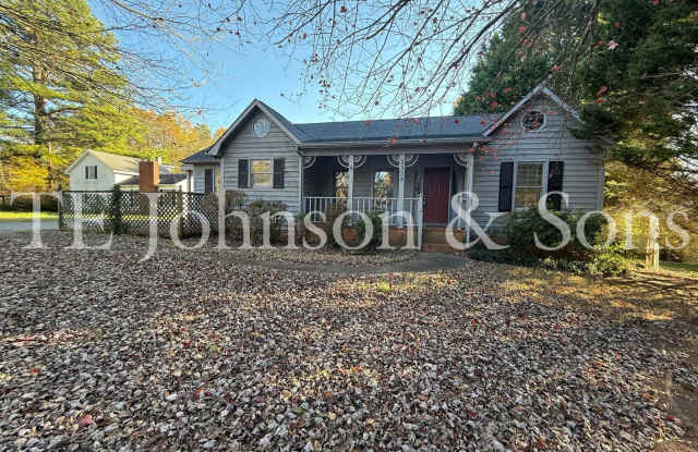 Charming 3-Bedroom Home with Rocking Chair Porch and Screened Back Patio photos photos