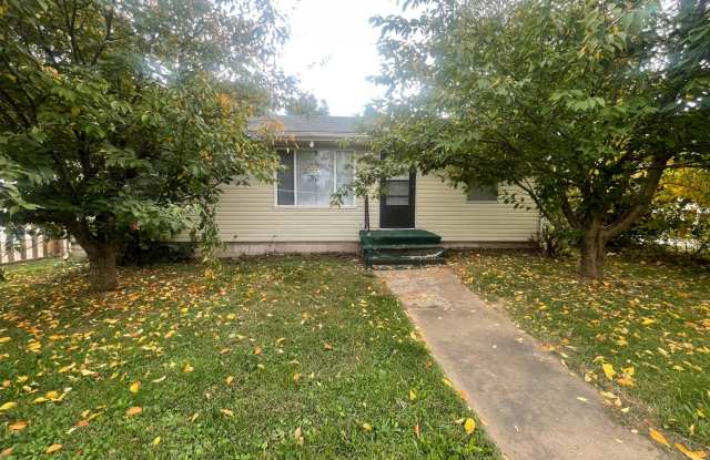 Spacious 4 bedroom home with a detached 2 car garage available now! - 2416 West Nichols Street, Springfield, MO 65802