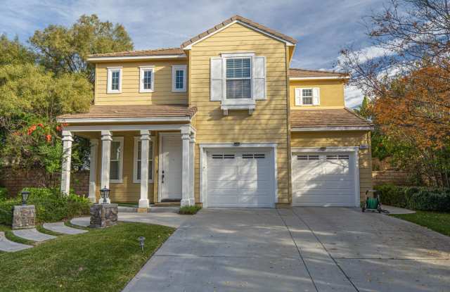 Spacious 4-Bedroom Home with Downstairs Bed/Bath  Full Community Access in Valencia! photos photos