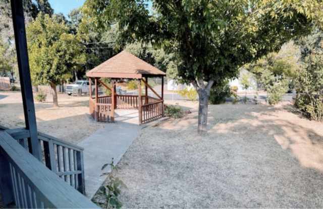 Charming 2BR/2BA Country Home with Bonus Room, Expansive Yard, & Large Decks Gallery 3