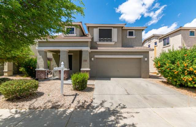 Welcome home to this stunning Surprise home with 4 beds and 2.5 baths! photos photos