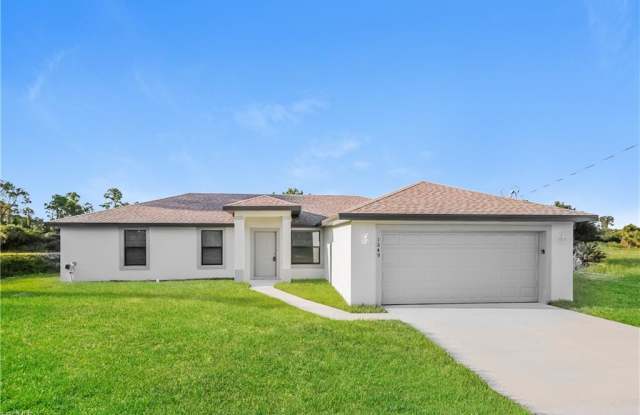 1249 Cordoba Street East - 1249 Cordoba Street East, Lehigh Acres, FL 33974