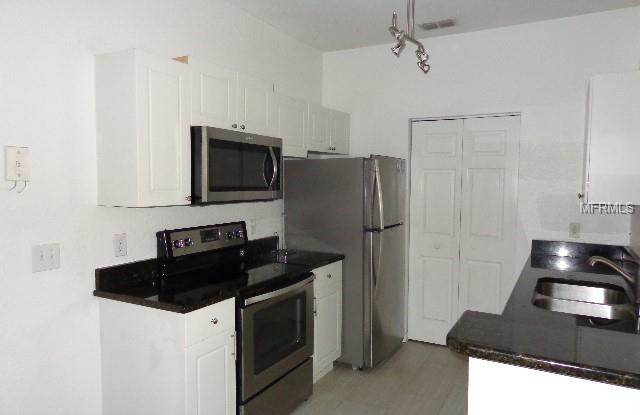 860 GRAND REGENCY POINTE UNIT 101 Gallery 2