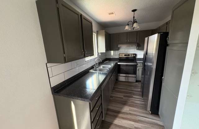 REDUCED PRICE! 3 Bed 2.5 Bath Home with 2 Car Detached Garage photos photos