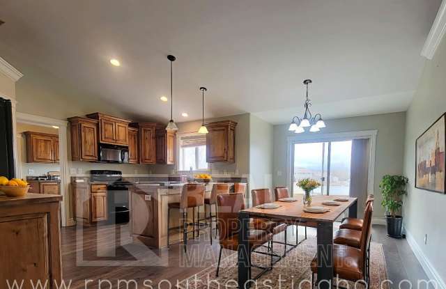 Large  Beautiful 6 Bedroom, 3 Bathroom House in For Rent in Rigby by Real Property Management photos photos
