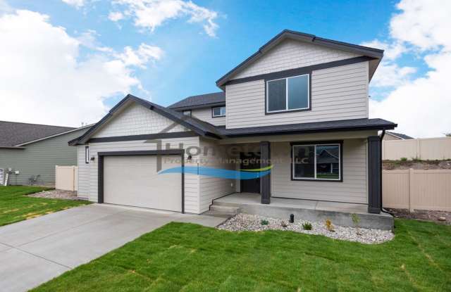 Woodbridge South Home with 4 Bedrooms and 3 Bathrooms in Post Falls build in 2021! photos photos