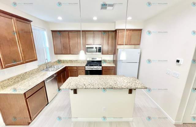 $1000 Off Move-In! Brand New - Never Lived In! 3-Bedroom 2.5 Bathroom 2 car garage townhome in Carson City. - 875 West End Street, Carson City, NV 89701
