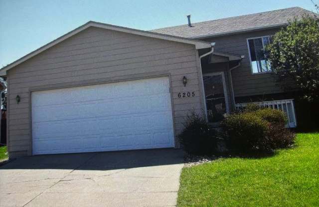 4 Bedroom • 2 Bathroom • 2‑Stall Attached Garage • Fenced‑In Yard photos photos