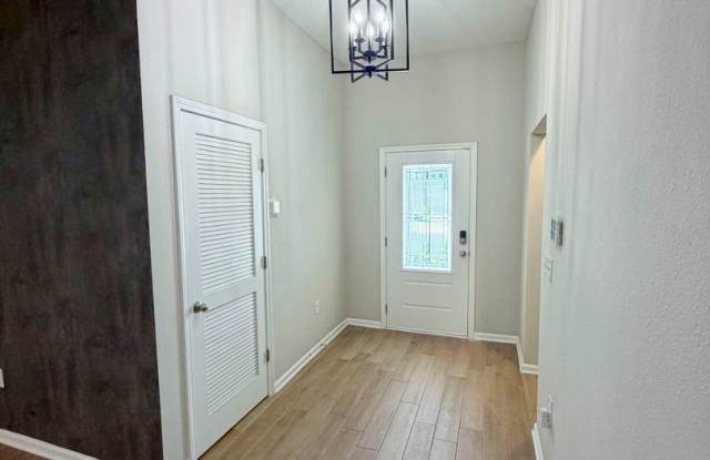 Spacious 4-bedroom, 2-bathroom home featuring an open-concept floor plan and a comfortable, modern layout Gallery 4