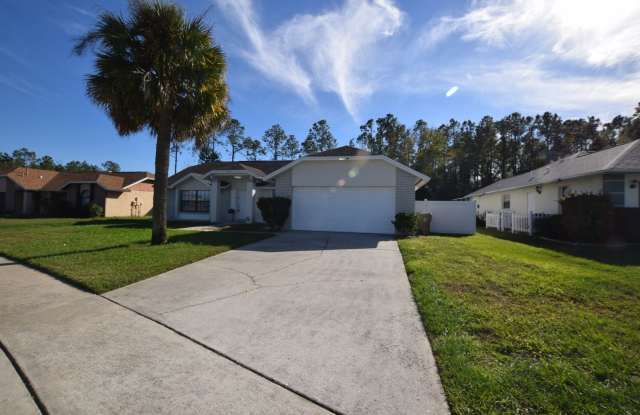 Beautiful 4 bedrooms/ 2baths home with a 2 car garage for rent at 17790 Indian Ridge Trl S., Kissimmee, FL 34747. photos photos
