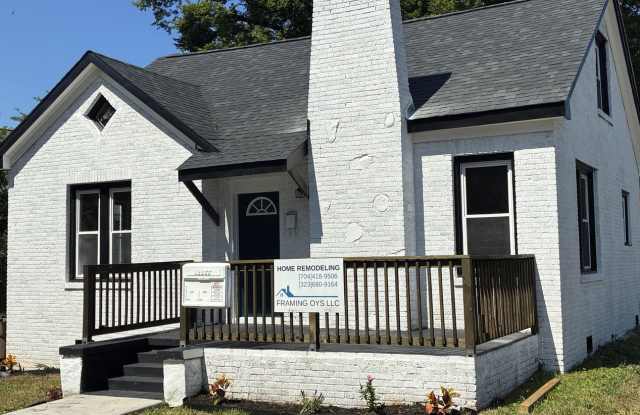 MOVE-IN READY NOW! This timeless beauty with great bones has been RENOVATED FROM TOP to BOTTOM! Gallery 3
