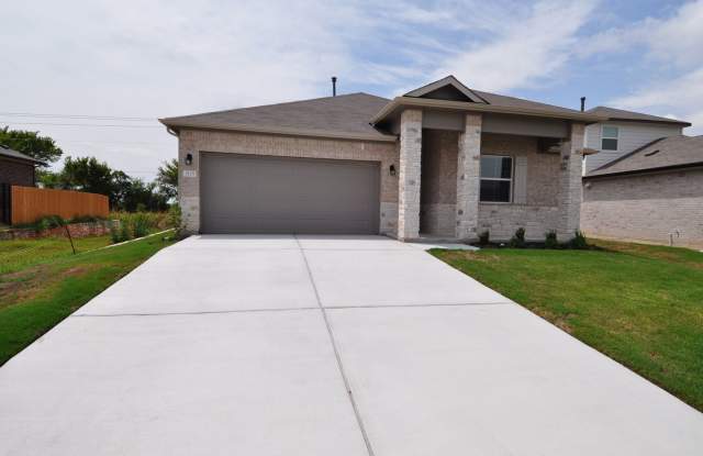 Home has an amazing entrance leading to the large family room open to the kitchen and dining room photos photos