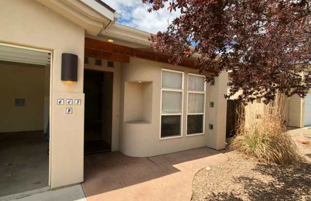Well-Maintained 3-Bedroom Townhome with 2-Car Garage in Desirable Location! photos photos