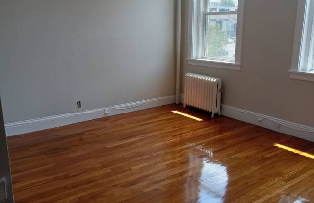 Gleaming hardwood floors in updated STUDIO Gallery 3