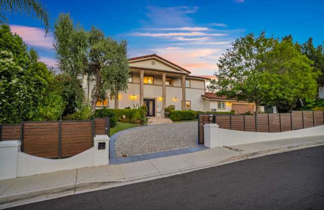 PRIVATE AND TRANQUIL COMPLETELY RENOVATED WOODLAND HILLS ESTATE! photos photos