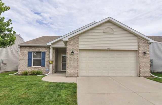 Ranch Style Home with Fence Backyard Gallery 1