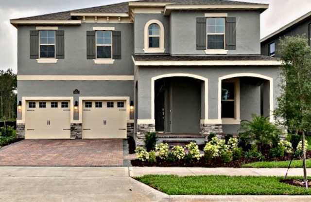 SPECTACULAR MODERN HOME!!Relaxing water views from the back of this beautiful home- MOVE IN September 2026-2 story 4 bed 3.5 bath HM in Waterleigh Winter Garden!!HOA handles lawn care! photos photos