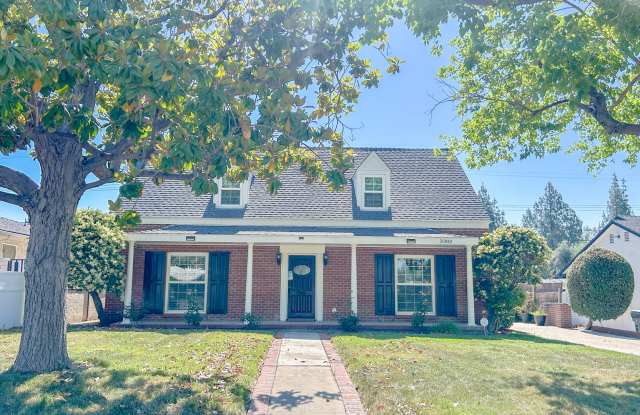 For rent! This charming 4-bedroom, 3-bathroom traditional-style home photos photos