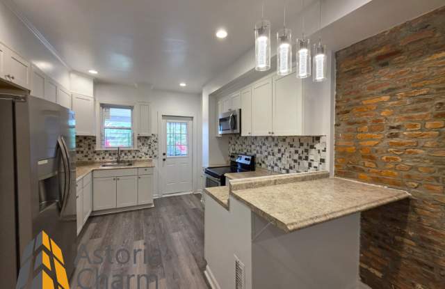 3 Bedroom End Unit with Finished Basement and Fenced Yard on E 28th Street photos photos