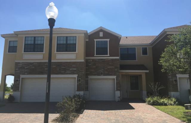 3 Bedroom, 2.5 Bathroom one car Garage, 2 Car Drive Way, Water Front, Gated Community at 1973 Portofino Medows Blvd, Orlando, FL 32824 - 1973 Portofino Meadows Boulevard, Meadow Woods, FL 32824