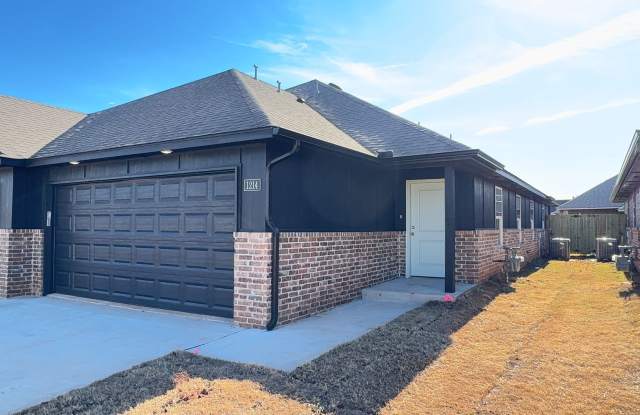 Welcome to Brand New Masonwood featuring this 3 Bedroom 2 Bath 2 Car Garage Duplex in a Great location close to the Broadway Extension and only 8 minutes from downtown OKC photos photos