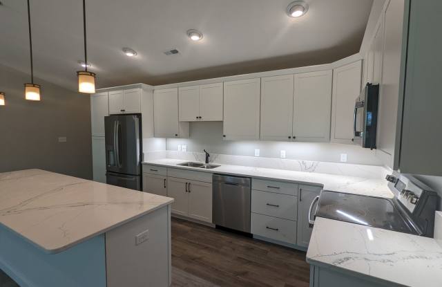 Experience modern living in this brand new beautifully designed 5-bedroom, 3 full-bath home in East Terre Haute. photos photos