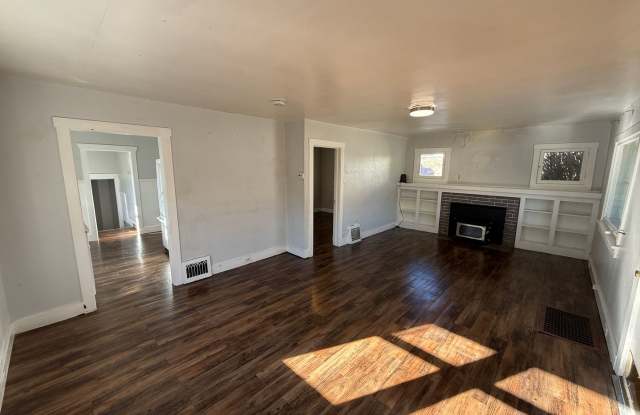 Beautiful 4 Bed, 3 Bath House; W/D Included; Fenced Yard; Wood Floors; and a Charming Style - 918 Greenwood Terrace, Salt Lake City, UT 84105