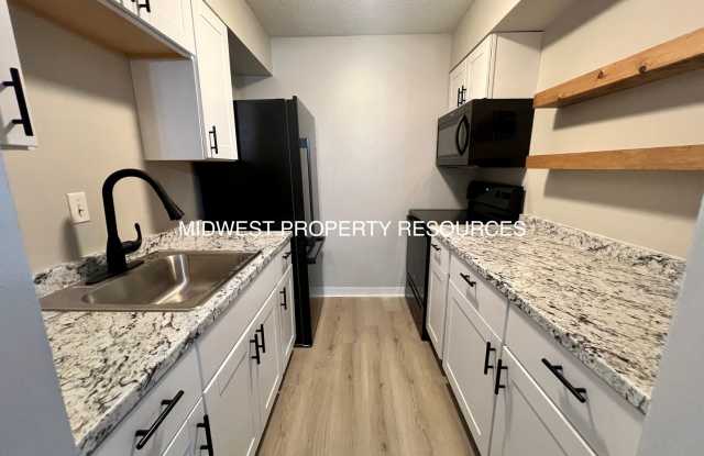 Stunning 1 Bedroom Apartment w/ Covered Parking photos photos