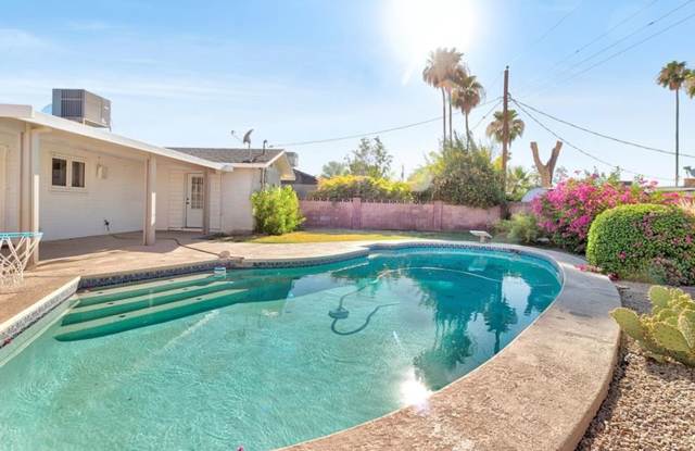4 BEDROOM 2 BATHROOM SCOTTSDALE HOME! PRIVATE BACKYARD WITH SPARKLING POOL! photos photos