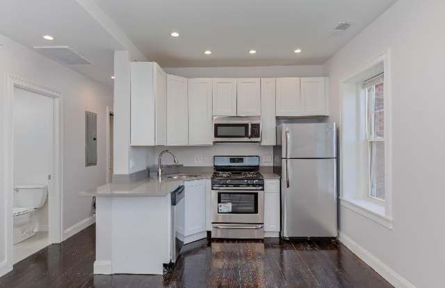 Stunning Renovated 4 Bed • 2 Bath South End Brownstone | In-Unit Laundry • Central Air • Exposed Brick | 9/1/2026 photos photos