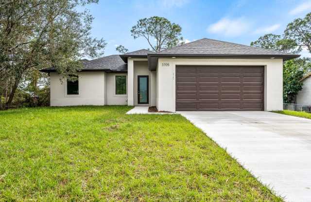 Beautifully Renovated Home with Modern Open-Concept Design in Lehigh Acres photos photos