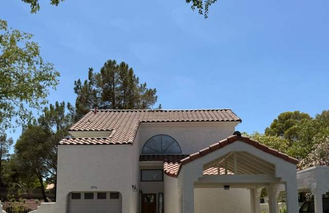 TWO BEDROOM TOWNHOME IN THE LAKES WITH GARAGE AND ATTACHED CARPORT Gallery 1