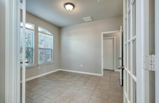 Beautiful 4/2.5/2 two story with office on oversized corner lot! Gallery 4
