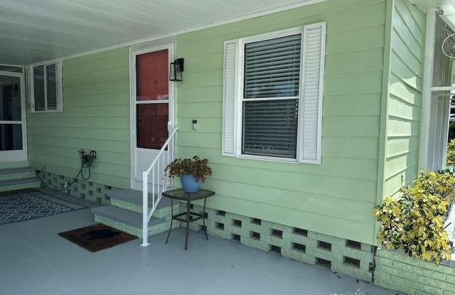 Updated Coastal 2BR/2BA Corner Lot Home in Gated 55+ Resort Gallery 4