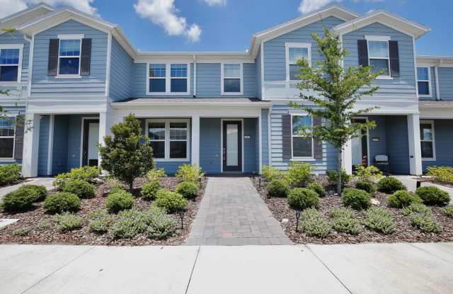 Beautiful 3/2.5 Modern Townhome with a Private Courtyard and a 2 Car Garage in the Gated Isles of Lake Nona - Orlando! photos photos