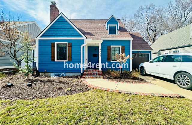 Charming, Prairie Village Home in a Quiet Neighborhood with Wood Floors and a Fenced Yard! photos photos