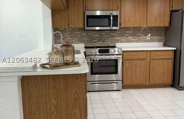 1005 Palm Beach Trace Dr photos photos