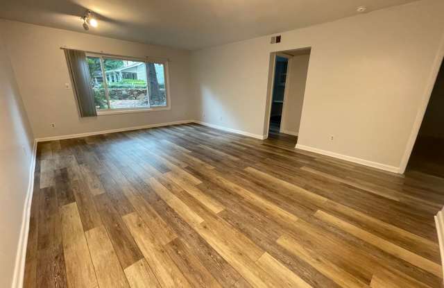 Walk to Campus from Chancellor Square! Updated end-unit in sweet Chapel Hill location. Gallery 1