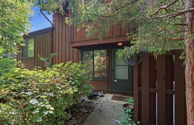 Tucked within the serene, tree lined setting of Covington, this contemporary townhome offers a refined sense of privacy paired with modern design. Gallery 1