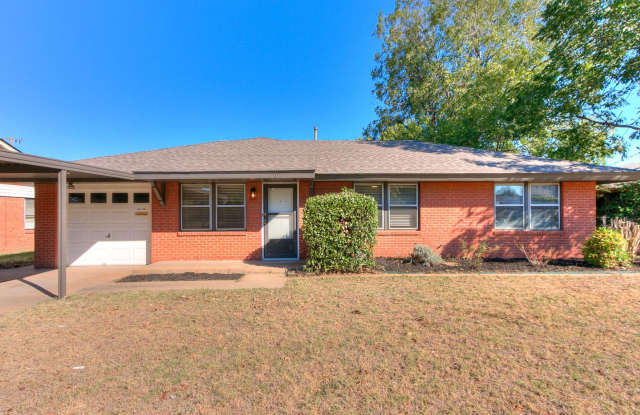 Clean 3 bed 2 bath brick home with garage and shop for lease Gallery 1