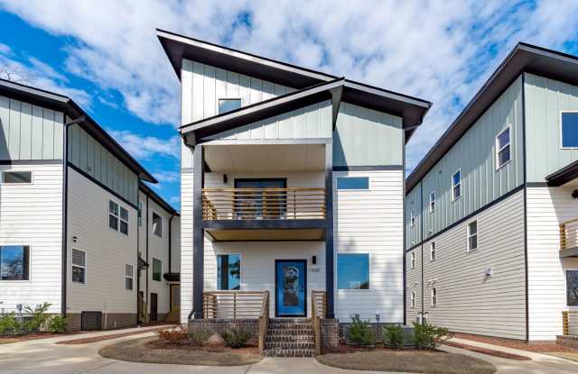 **OFFERING RENT PROMOTION FOR FIRST 6 MONTHS, WAIVED APPLICATION FEES  $300 MOVE IN PROMOTION** Luxurious New Construction 3BD, 4BA Downtown Raleigh Townhome with Spacious Balcony and Natural Light Throughout photos photos